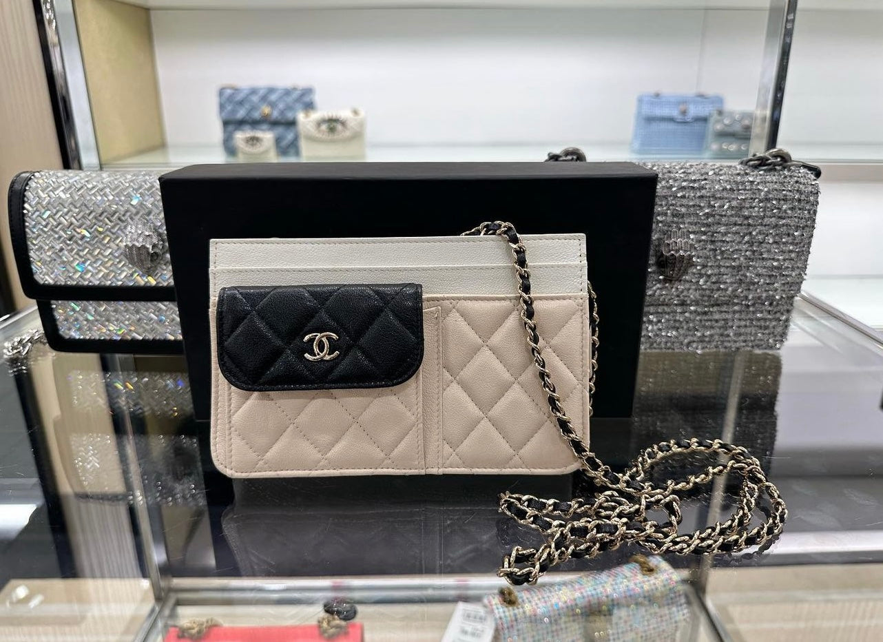 CHANEL Goatskin Quilted Tri-Color In & Out Chain Wallet Beige w Black –  Vegaluxuries